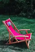 Deckchair with arms and padded head rest