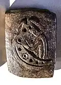 Decorated stone ritual objects with dog motif, Kortik Tepe, 10,400-9250 BCE, Diyarbakır Archaeology Museum.[19]