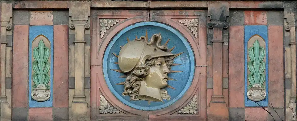 Neoclassical polychrome medallion on the Beaux Arts facade of the Lycée Carnot, Dijon, designed by Arthur Chaudouet, 1885–1893