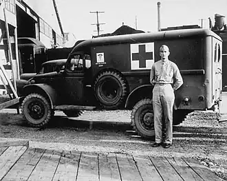 Ambulance at entrance to Pier 5, waiting for debarkation of wounded American soldiers from Tunisia.