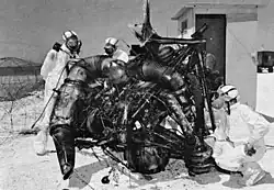 Inspection of Thor rocket engine remains after failure of Bluegill Prime nuclear test attempt on 25 July 1962.