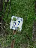 Pre-MUTCD standard route marker for CR 57 in Dutchess County. Most of the county now uses the standard pentagon.