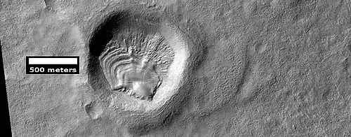 Layered feature in crater, as seen by HiRISE under HiWish program