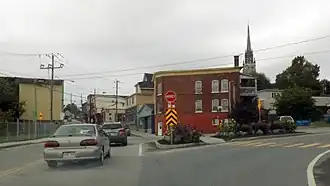 In the town of East Angus, near west end of Route 214.