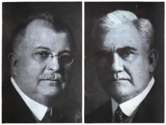 man with glasses and mustache on left and white-haired man on right