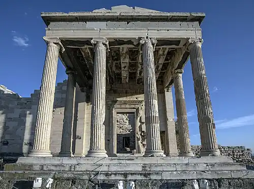Ancient Greek Ionic columns of the Erechtheion, Athens, Greece, with parallel volutes, unknown architect, 421-405 BC[19]