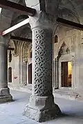 Carved column in the courtyard