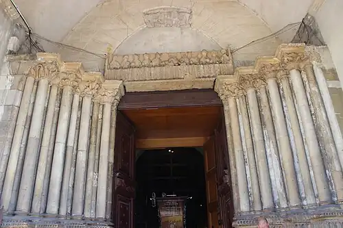 The West Portal, beneath a sculpture of the Last Supper (12th c.)