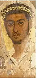 Fayum mummy portrait with the rhombus-shaped leaves representing laurel