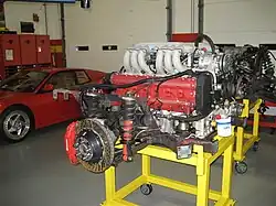 A 12-cylinder Ferrari Testarossa engine in an engine stand