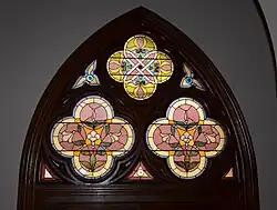 Above northern main-entrance door