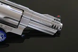 The S&W Model 500 revolver features a muzzle brake