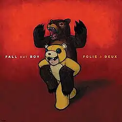 A drawing of a person, dressed in a bear costume, giving a piggyback ride to an actual bear, on a red background. The band name is written on the left in white, and the album title is written to the right in yellow, respectively.