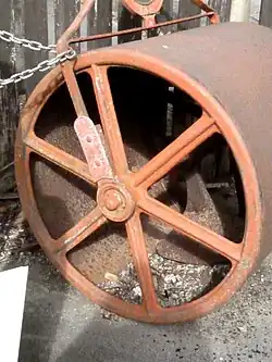 Large iron roller with suspended weight, for bowling greens, by Fred Verity (1890s)