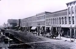 Front Street looking west toward the rest of the district in the year 1880