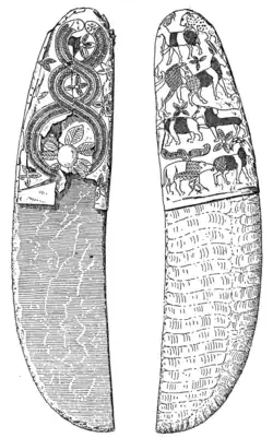 The Gebel-Tarif knife of the Naqada III period. The "snake twist around rosette" is another Mesopotamian motif.[40][63]