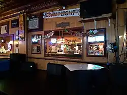 Stage with wooden wall adorned with mirrors