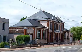 The town hall and school in Girolles