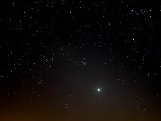 The bright Venus in the cone of the zodiacal light 8 degrees above the western horizon on 23 March 2020. This was eleven days before Venus approached the Golden Gate of the Ecliptic (centre) between the Pleiades (right) and the Hyades together with Aldebaran (left) in the constellation Taurus (centre).