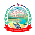 The seal features Prithvi Narayan Shah in the foreground with the outline Gorkha Palace in the background. There is also a balance scale near the outline of palace representing equality. The seal is surrounded by flag of Nepal in the top, two rhododendron flower on each side of the flag and a laurel on the left and right side. A red ribbon with the words Gorkha Municipality, Nepal in Nepali language is at the bottom.