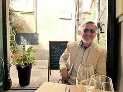 Grasso in Lake Como leading a Michigan Alumni tour of Northern Italy in 2024.