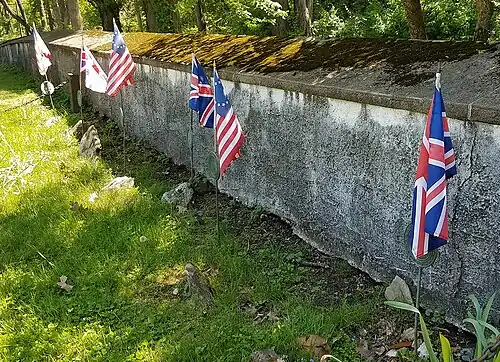 Shared war graves of British and American soldiers killed in the American Revolution, located in the churchyard of St. Peter's Church in the Great Valley, Chester County, Pennsylvania