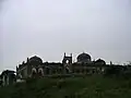 View of the mosque, in monsoon, covered with seasonal grass