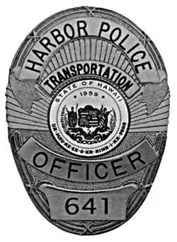 HP officer badge, with random badge number.