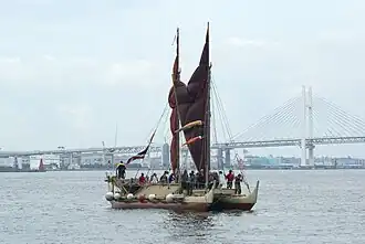 Hokule'a with her kaula pe'a (sail lines) tightened to partly close her crab-claw sails.[18]