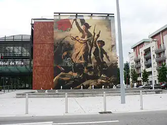 The Hôtel de Ville with Eugène Delacroix's Liberty Leading the People reproduced on its façade