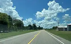 Hugo along Alabama State Route 28. The CSX Railway is located on the left side of the image.