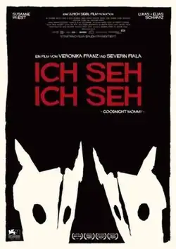 Two dragon masks on a dark background.