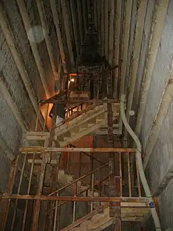 Second chamber with the wooden staircase leading to the burial chamber