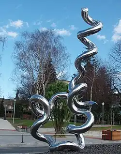 A curling metal tube.