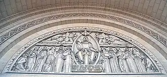 Tympanum on interior of entrance to Basilica at Lisieux. Shows Jesus with the Apostles and the Virgin of Mount Carmel.