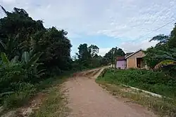 A road that connects the hamlet of Sidrap with Bontang City.