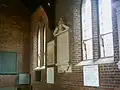 Interior of the 1907 church showing memorial plaques