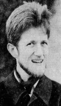 Black and white headshot photo of Mayer