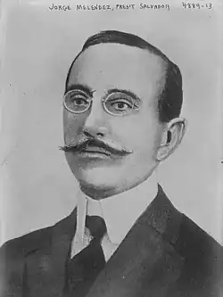 A black-and-white portrait photograph of Jorge Meléndez