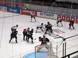 Kärpät (black) face off against Frölunda (white) at Energia Areena during the 2015 CHL Playoffs semifinal.