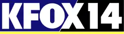 Bold sans serif lettering "KFOX 14", with the "FOX" being the same letters as the Fox network logo, on a background split between blue and black with a yellow line below.