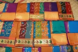 Image 13Kanchipuram silk saris worn by women on special occasions. (from Tamils)