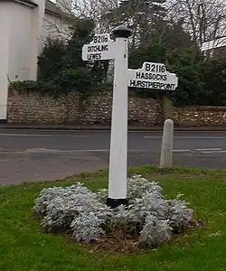 A finger post at Keymer in West Sussex (formerly East Sussex), showing the B-road number and significant destinations on it