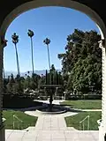 View from the front porch showing the gardens and the San Bernardino Valley beyond.