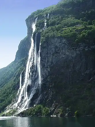 View of Knivsflå by the Seven Sisters waterfall, 240 m (790 ft) above the Geirangerfjord. Credit: Frode Inge Helland