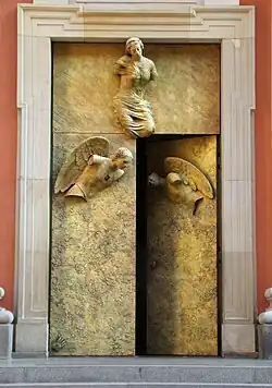 Church doors by Igor Mitoraj in daylight