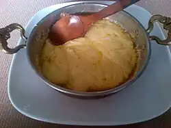 Cheese dish in a copper pan