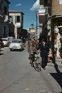 Pedestrians in a narrow city street