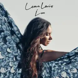 A young, mixed race woman looks towards the camera. Sprouting out of her back are a pair of giant butterfly wings and the words "Leona Lewis: I Am" above her.