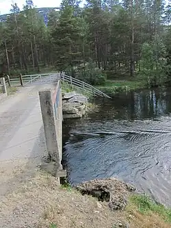 Bridge at Bryggeosen, outflow from eastern to western part of the lake